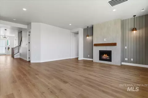 Living - 7856 W Flathead Lake St #SIERRA MUI GEN - STAGED!, Eagle, ID 83616 photo 3 of 5