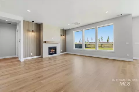 Living - 7856 W Flathead Lake St #SIERRA MUI GEN - STAGED!, Eagle, ID 83616 photo 4 of 5