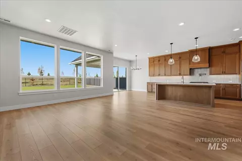 Living - 7856 W Flathead Lake St #SIERRA MUI GEN - STAGED!, Eagle, ID 83616 photo 2 of 5