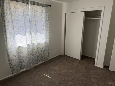 Bedroom - 303 E Avenue J, Jerome, ID 83338 photo 1 of 2