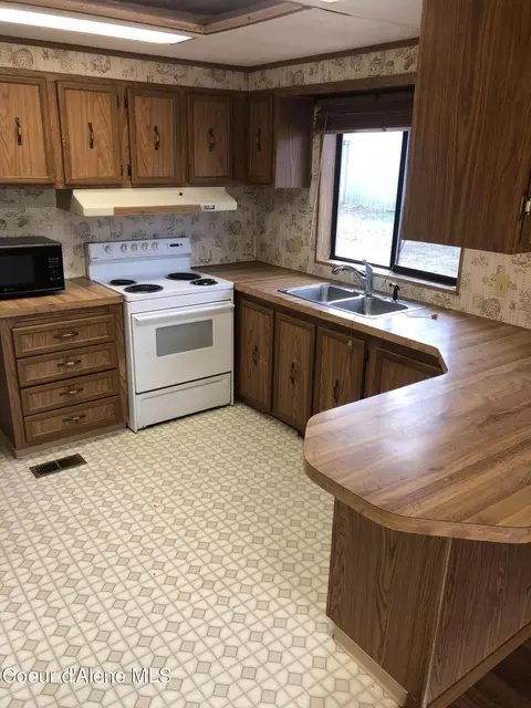 Kitchen - 9076 E Howard Rd, Athol, ID 83801 photo 2 of 2