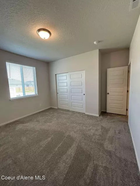 Bedroom - 327 E Burdock Lp, Hayden, ID 83835 photo 1 of 3