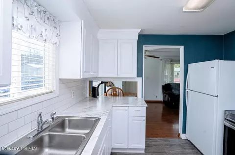 Kitchen - 407 S 5th St, Pinehurst, ID 83850 photo 4 of 6