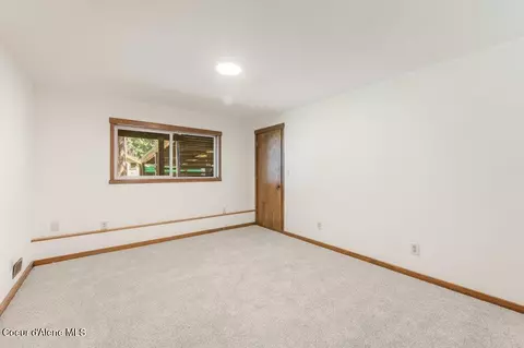Bedroom - 8473 E Apache Trl, Athol, ID 83801 photo 3 of 10