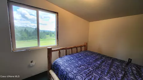 Bedroom - 6202 E Wood Ln, Harrison, ID 83833 photo 3 of 4