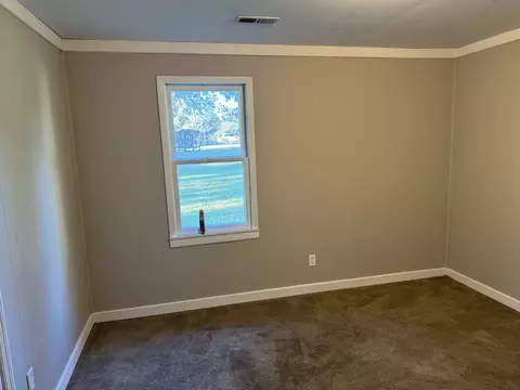 Bedroom - 302 Main St, Ethridge, TN 38456 photo 4 of 5