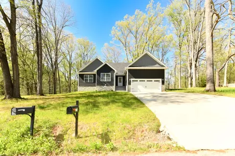 Exterior - 210 Patrick Dr, Dover, TN 37058 photo 2 of 11
