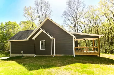 Exterior - 210 Patrick Dr, Dover, TN 37058 photo 9 of 11