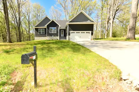Exterior - 210 Patrick Dr, Dover, TN 37058 photo 3 of 11