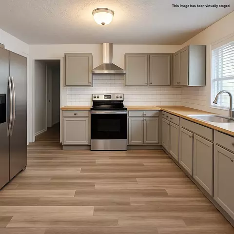Kitchen - 502 E Market St, Decherd, TN 37324 photo 2 of 3