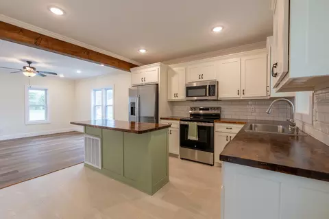 Kitchen - 402 W Commerce St, Loretto, TN 38469 photo 2 of 2