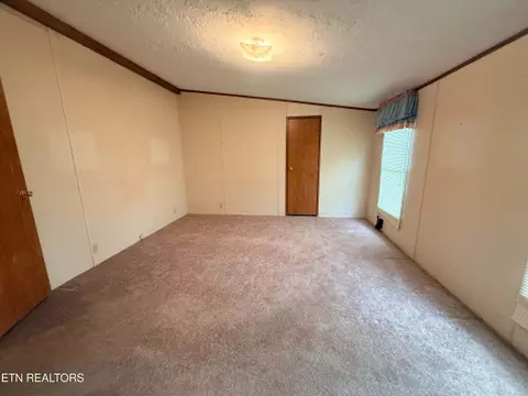 Bedroom - 1243 Franklin Loop #5ACRES, Clarkrange, TN 38553 photo 3 of 5