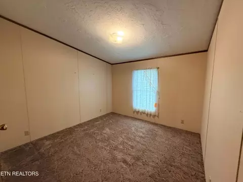 Bedroom - 1243 Franklin Loop #5ACRES, Clarkrange, TN 38553 photo 5 of 5