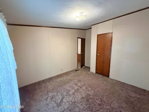 Bedroom - 1243 Franklin Loop #5ACRES, Clarkrange, TN 38553 photo 4 of 5
