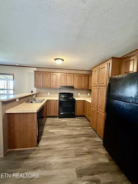 Kitchen - 146 Barnett Bridge Rd, Lancing, TN 37770 photo 2 of 2