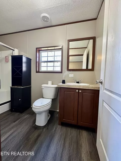 Bath - 146 Barnett Bridge Rd, Lancing, TN 37770 photo 1 of 3