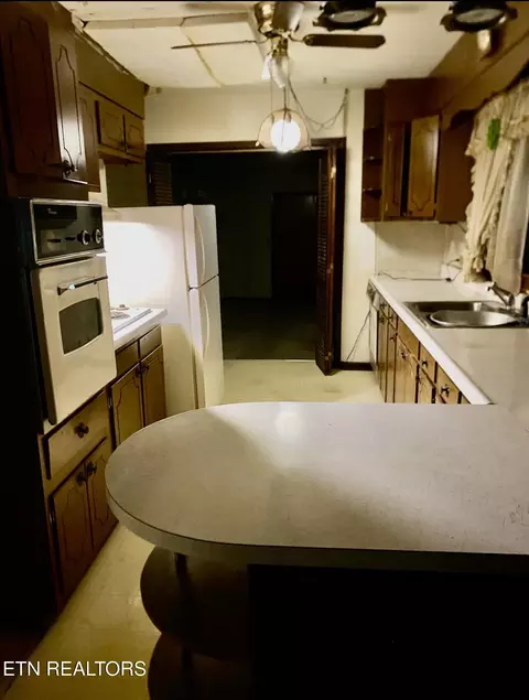 Kitchen - 11532 Wilderness Rd, Ewing, VA 24248 photo 2 of 2