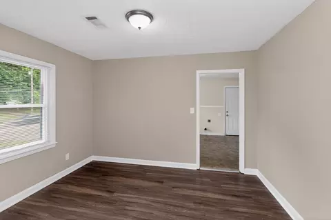 Living - 318 E Raines Rd, Memphis, TN 38109 photo 1 of 5