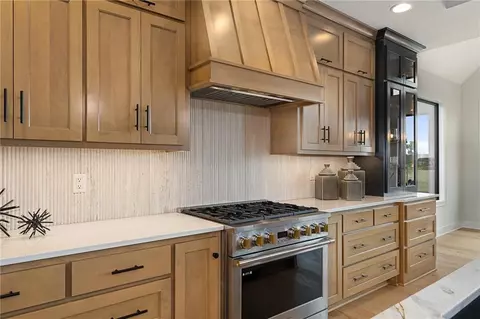 Kitchen - 1406 Upton Ct, Raymore, MO 64083 photo 7 of 8