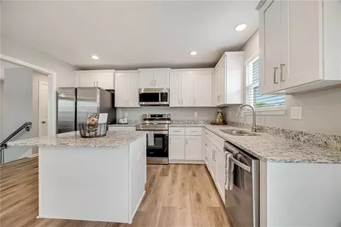Kitchen - 508 Foxglove Ln, Raymore, MO 64083 photo 2 of 2