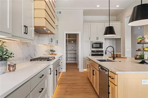 Kitchen - 605 Hampstead Dr, Raymore, MO 64083 photo 5 of 10