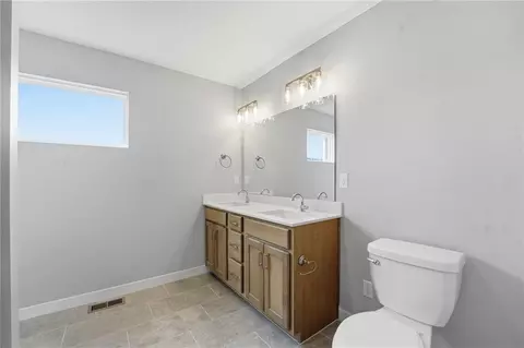 Bath - 706 Glenn Cir, Raymore, MO 64083 photo 3 of 4