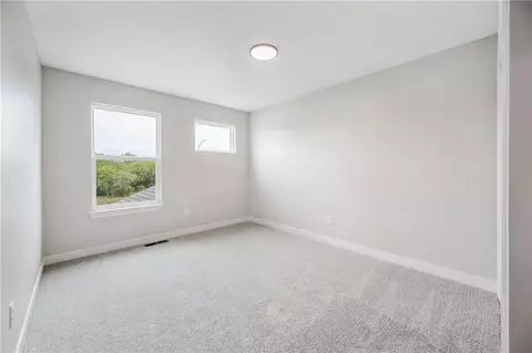 Bedroom - 838 Reed Dr, Raymore, MO 64083 photo 6 of 9