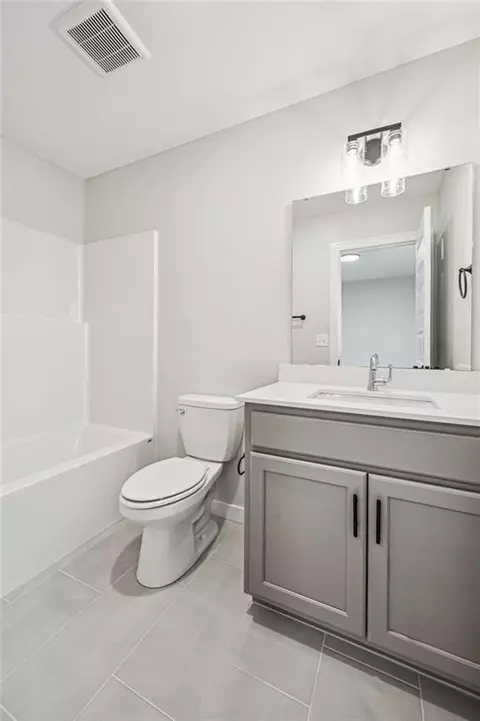 Bath - 838 Reed Dr, Raymore, MO 64083 photo 3 of 3