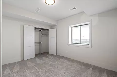 Bedroom - 1401 Kintyre Ct, Raymore, MO 64083 photo 6 of 9