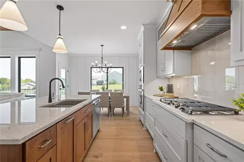 Kitchen - 1401 Kintyre Ct, Raymore, MO 64083 photo 3 of 5