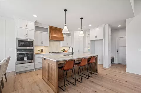 Kitchen - 1401 Kintyre Ct, Raymore, MO 64083 photo 2 of 5