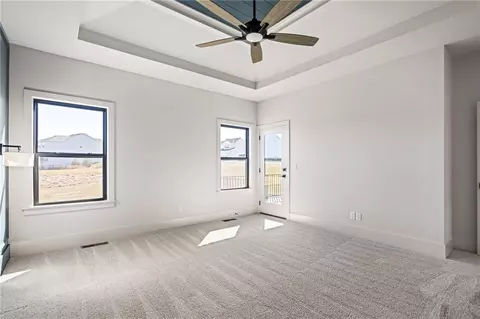 Bedroom - 1401 Kintyre Ct, Raymore, MO 64083 photo 2 of 4