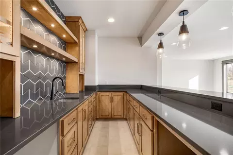 Kitchen - 703 Hampstead Dr, Raymore, MO 64083 photo 3 of 3