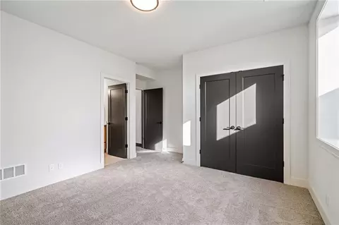 Bedroom - 703 Hampstead Dr, Raymore, MO 64083 photo 8 of 8