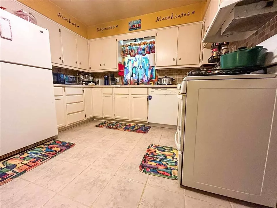 Kitchen - 529 N 5th St, Lacygne, KS 66040 photo 4 of 5