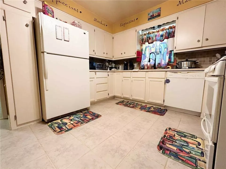 Kitchen - 529 N 5th St, Lacygne, KS 66040 photo 3 of 5