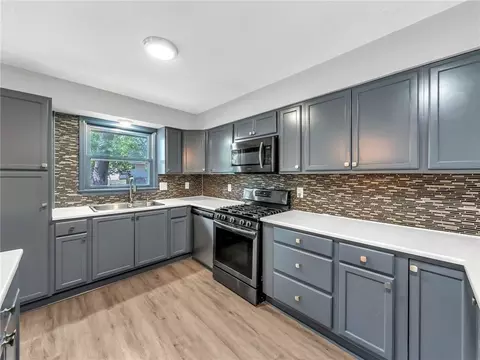 Kitchen - 1300 NE Browning Ln, Lees Summit, MO 64086 photo 3 of 4