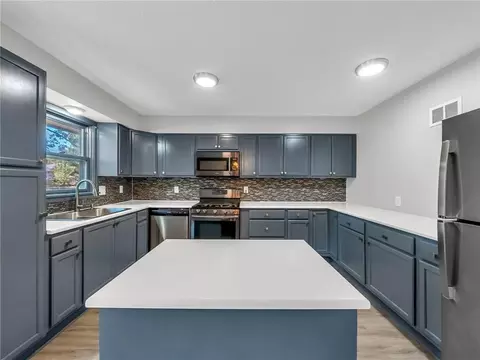 Kitchen - 1300 NE Browning Ln, Lees Summit, MO 64086 photo 2 of 4