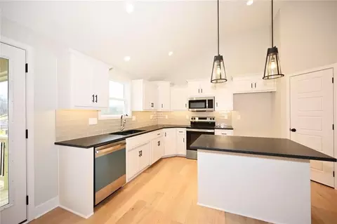 Kitchen - 103 Johnson Cir, Dearborn, MO 64439 photo 3 of 4