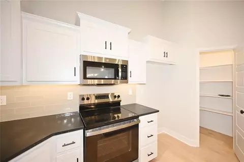 Kitchen - 103 Johnson Cir, Dearborn, MO 64439 photo 2 of 4
