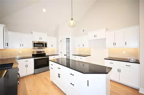 Kitchen - 105 Johnson Cir, Dearborn, MO 64439 photo 2 of 5