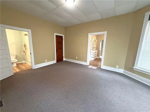 Living - 220 E Benton St, Carrollton, MO 64633 photo 3 of 4
