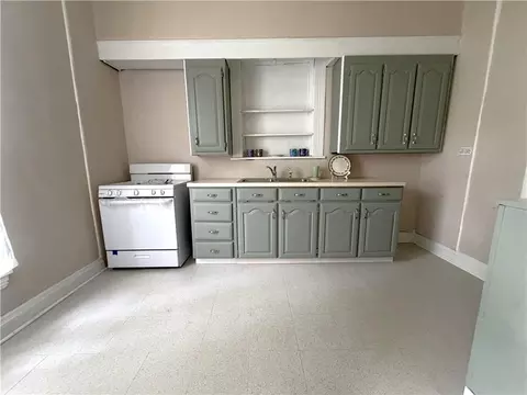 Kitchen - 220 E Benton St, Carrollton, MO 64633 photo 1 of 2