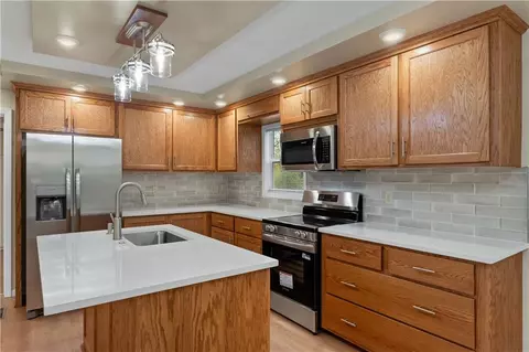 Kitchen - 730 E Cambridge Rd, Belton, MO 64012 photo 1 of 5