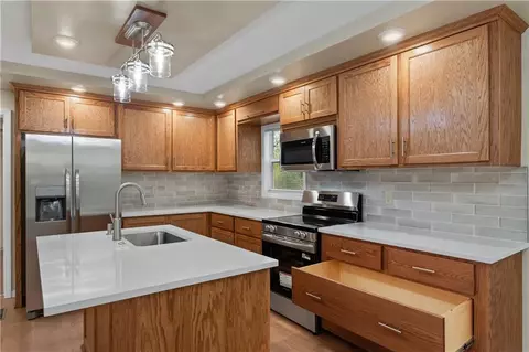 Kitchen - 730 E Cambridge Rd, Belton, MO 64012 photo 2 of 5