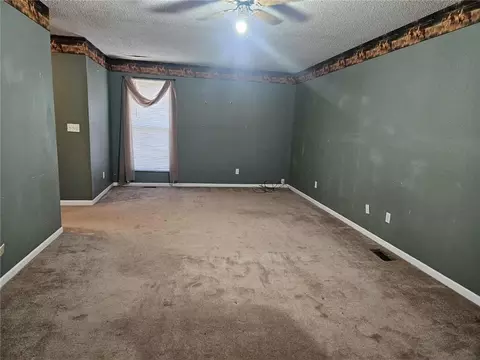 Living - 16003 E Katy Track Rd, Nevada, MO 64772 photo 3 of 6