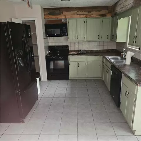 Kitchen - 415 E Buchanan St, Richmond, MO 64085 photo 1 of 1