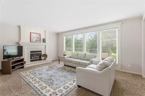 Living - 5920 NE Parks View Pl, Lees Summit, MO 64064 photo 1 of 3