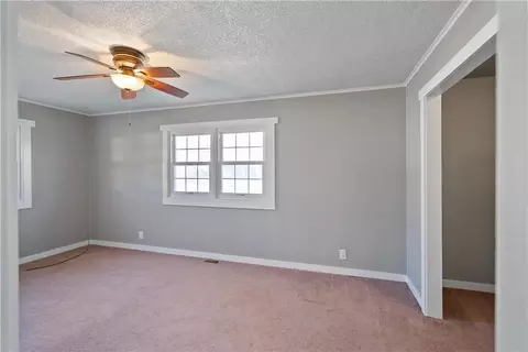Living - 611 E 5th Ave, Caney, KS 67333 photo 3 of 3