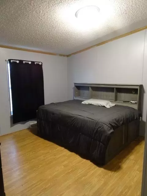 Bedroom - 14769 NE State Route E Hwy, Adrian, MO 64720 photo 5 of 9